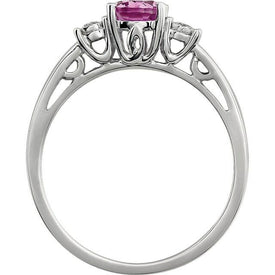 14k White Gold Oval Created Pink Sapphire and .04 ct.tw. Genuine Diamond Ring