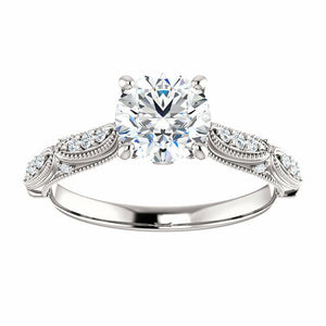 14K White Gold Round Forever One Moissanite & 1/10 CTW Diamond Engagement Ring