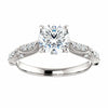 Platinum 6.5mm Round Forever One Moissanite & 1/10 CTW Diamond Engagement Ring